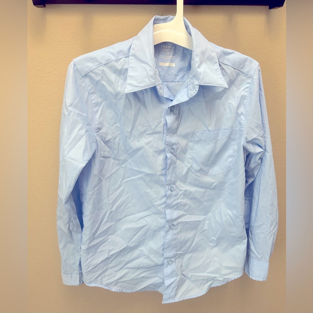 Blue long sleeve shirt size 12 boys 55%cotton 45% polyester.